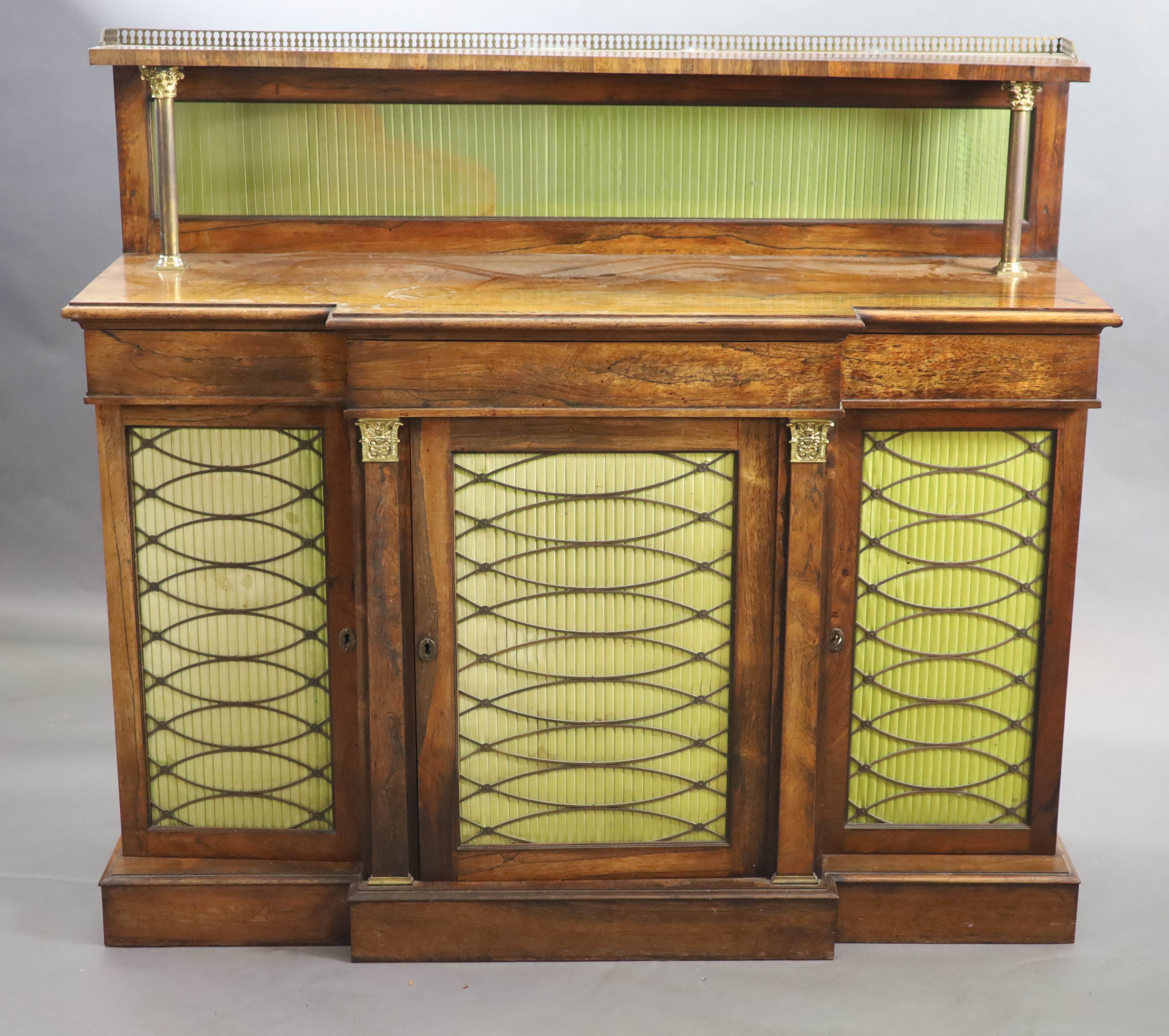 A Regency rosewood breakfront chiffonier, the raised back with three quarter gallery, W.136cm D.45cm H.123cm